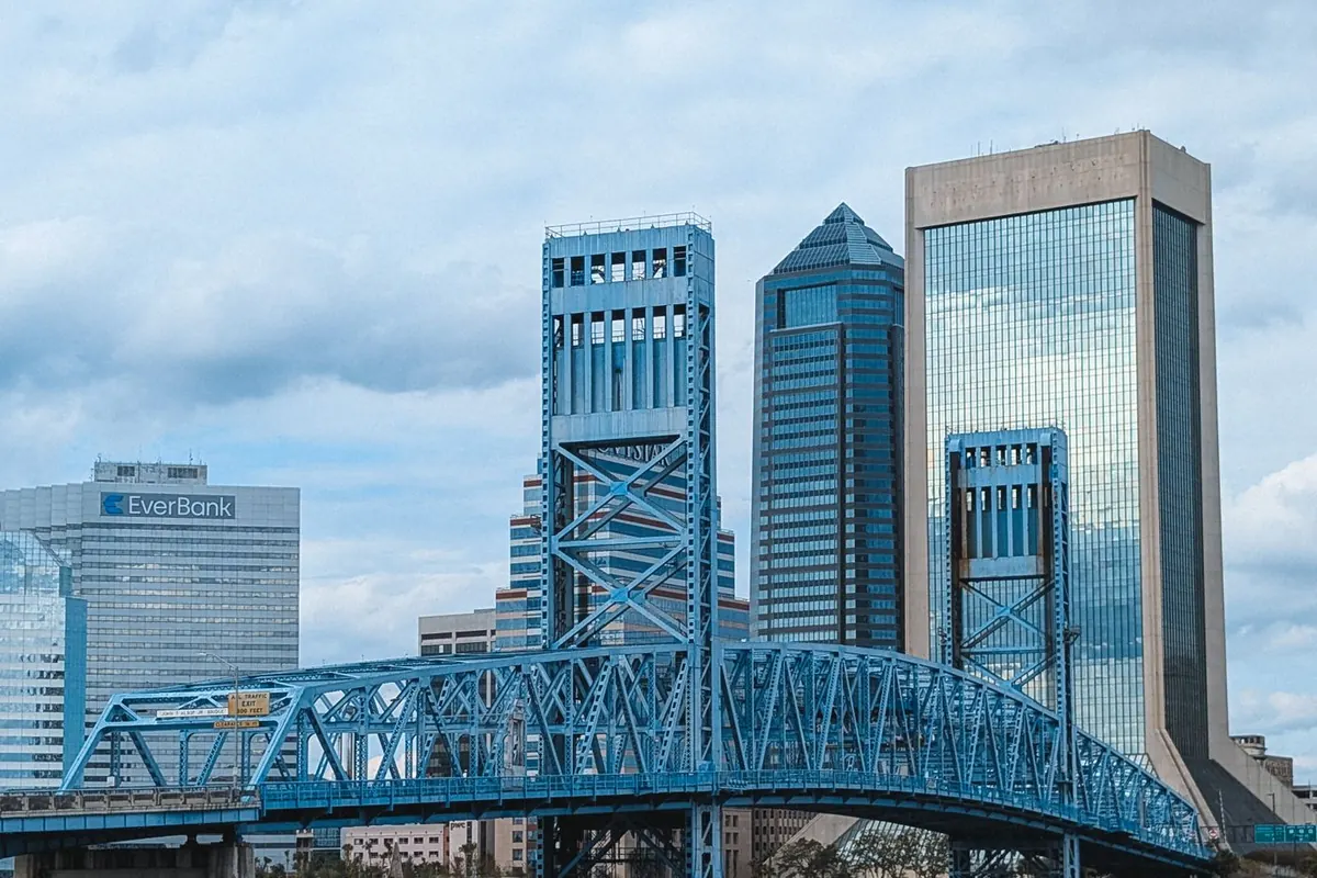 Downtown Jacksonville skyline behind the blue Main Street Bridge over the St. Johns River